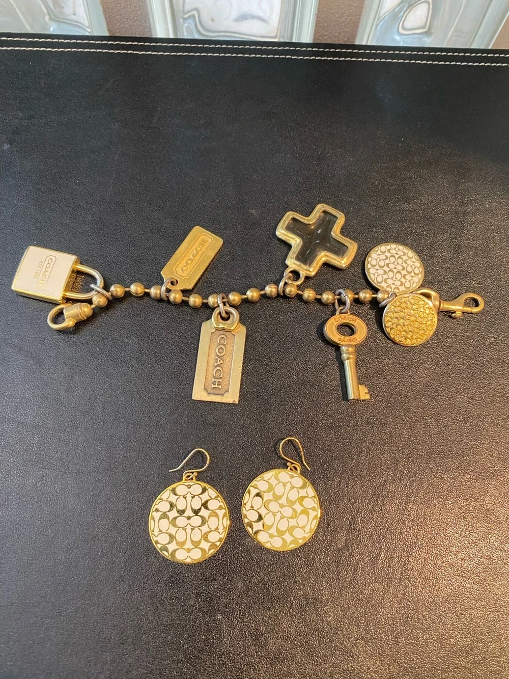 COACH Gold-Tone Brass Charm Bracelet with Signature C Logo Disc Drop Earring Set